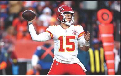 Patrick Mahomes (15) of the Kansas City Chiefs looks to pass in the second half of a game against the Denver Broncos at Empower Field At Mile High on Dec. 11, 2022, in Denver. Jamie Schwaberow | Getty Images | TNS